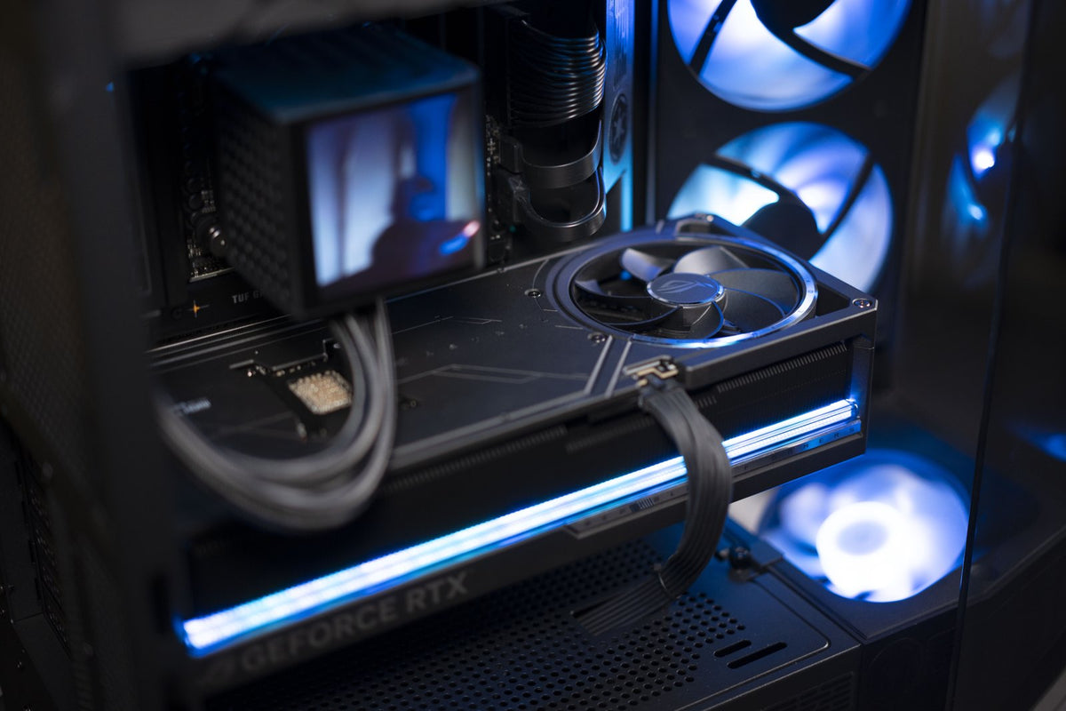 Inside a Computer City gaming PC with blue lighting