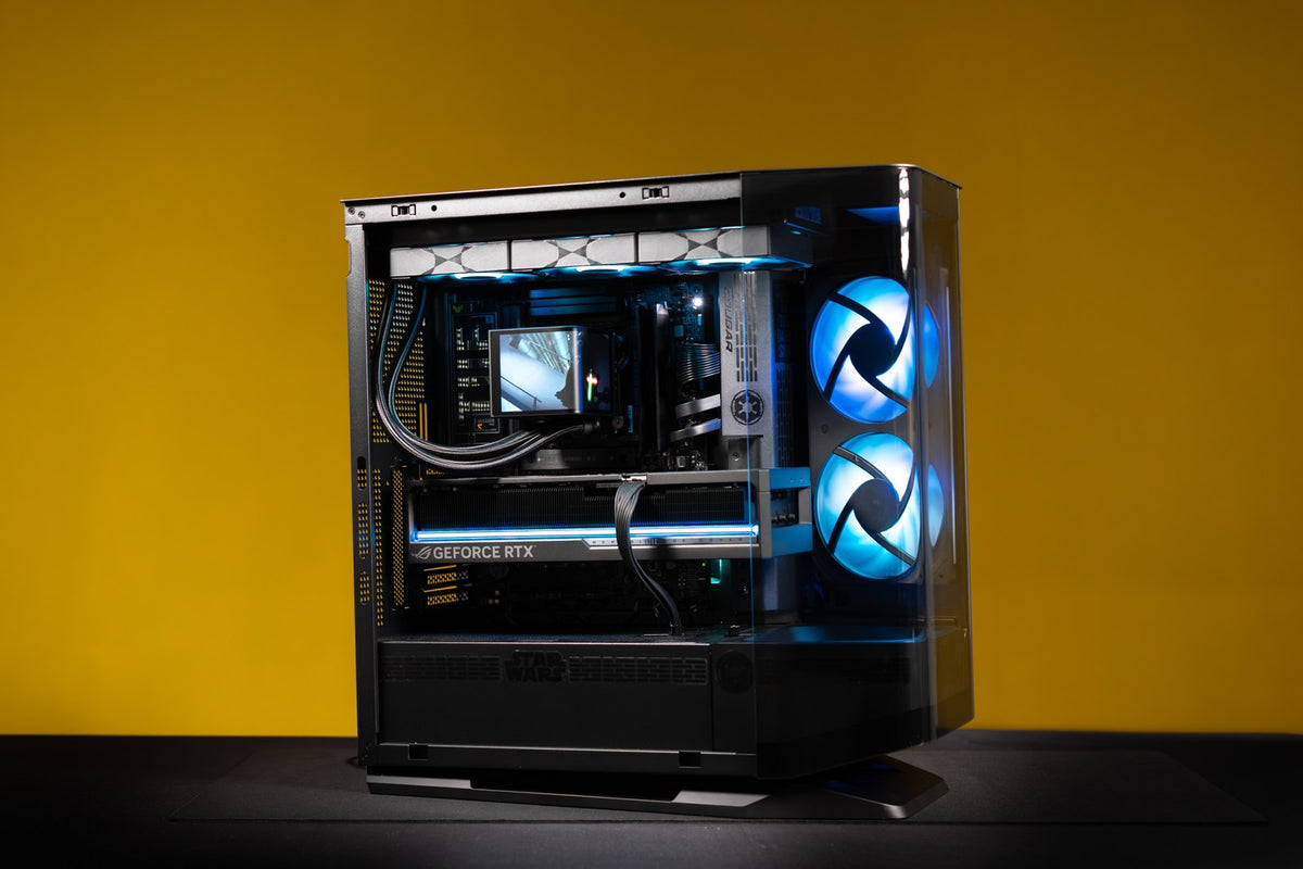 Imperial custom gaming PC with blue lighting on a yellow background